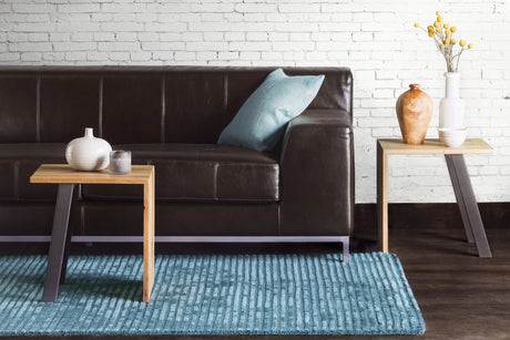Chandra Angelo ANG-26204 Blue rug, shown in a room setting