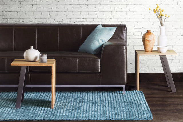 Chandra Angelo ANG-26204 Blue rug, shown in a room setting