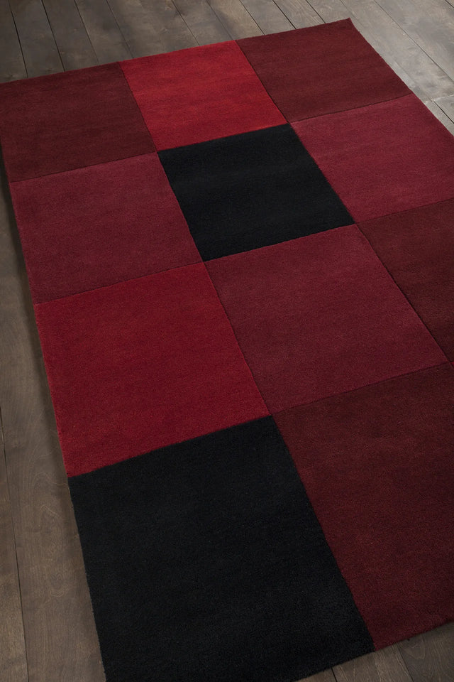 Chandra Antara ANT-109 Red and Black rug, angled side view
