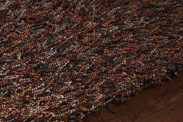 Chandra Astrid AST-14301 Red and Orange and Brown and Grey and Black rug, side detail view