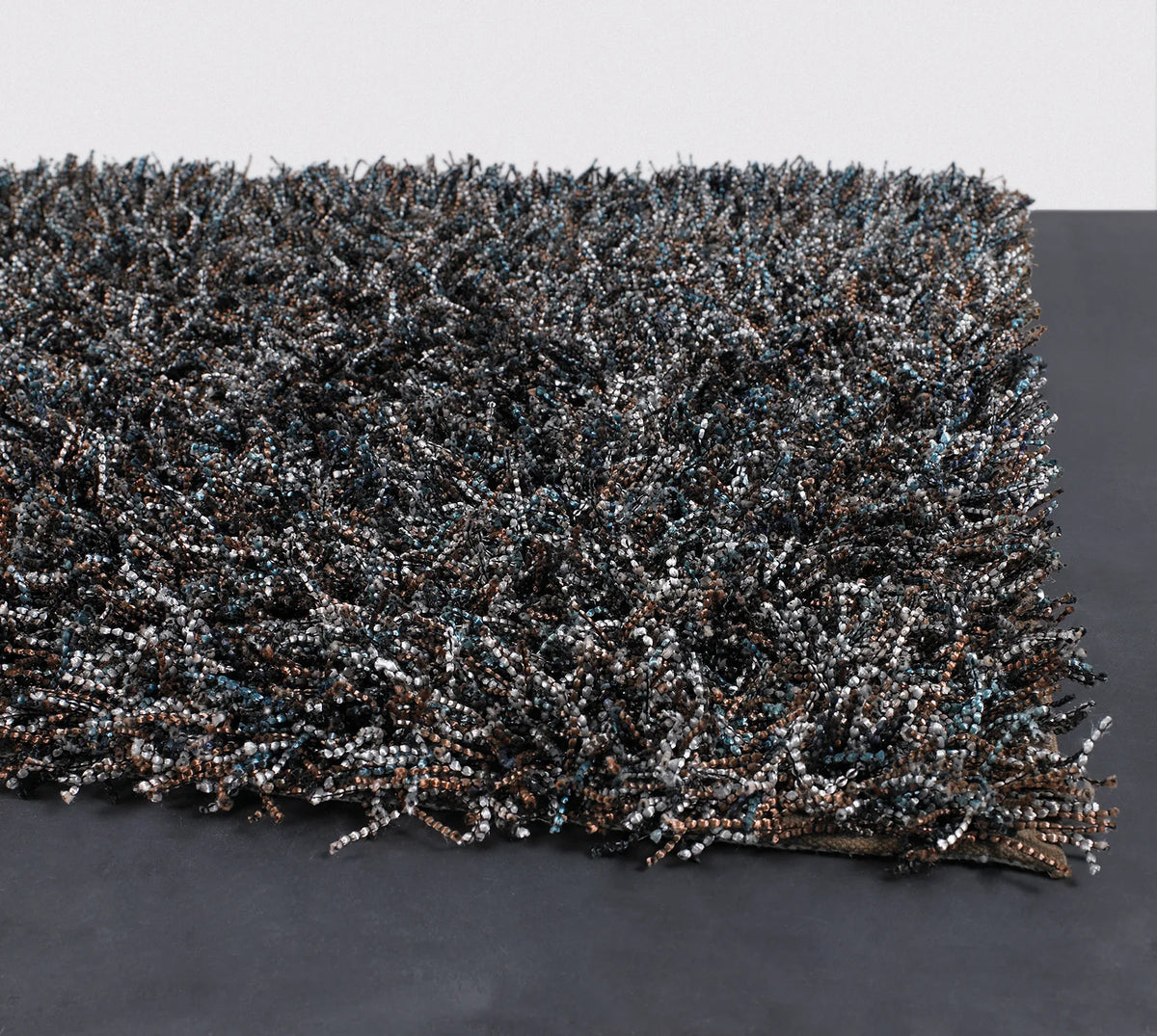 Chandra Astrid AST-14303 Brown and Blue and Grey and Black rug, corner detail