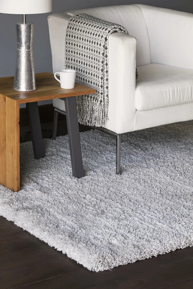 Chandra Bella BEL-51403 Grey rug, shown in a styled room setting
