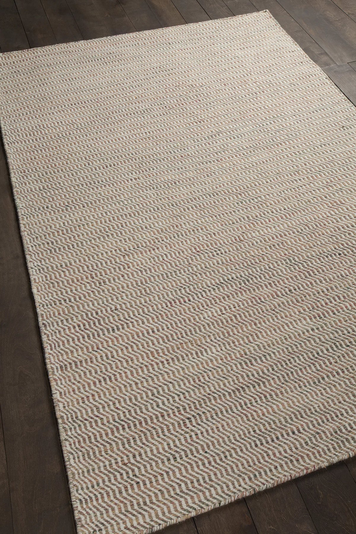 Chandra Crest CRE-33500 Beige and Brown rug, angled side view