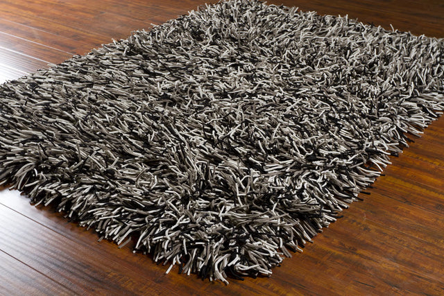 Chandra Cyrah CYR-10802 Black and Taupe and Ivory rug, styled detail view