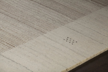 Chandra Elantra ELA-51700 Beige and Brown rug, side detail view