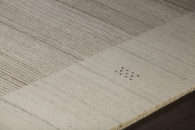 Chandra Elantra ELA-51700 Beige and Brown rug, side detail view