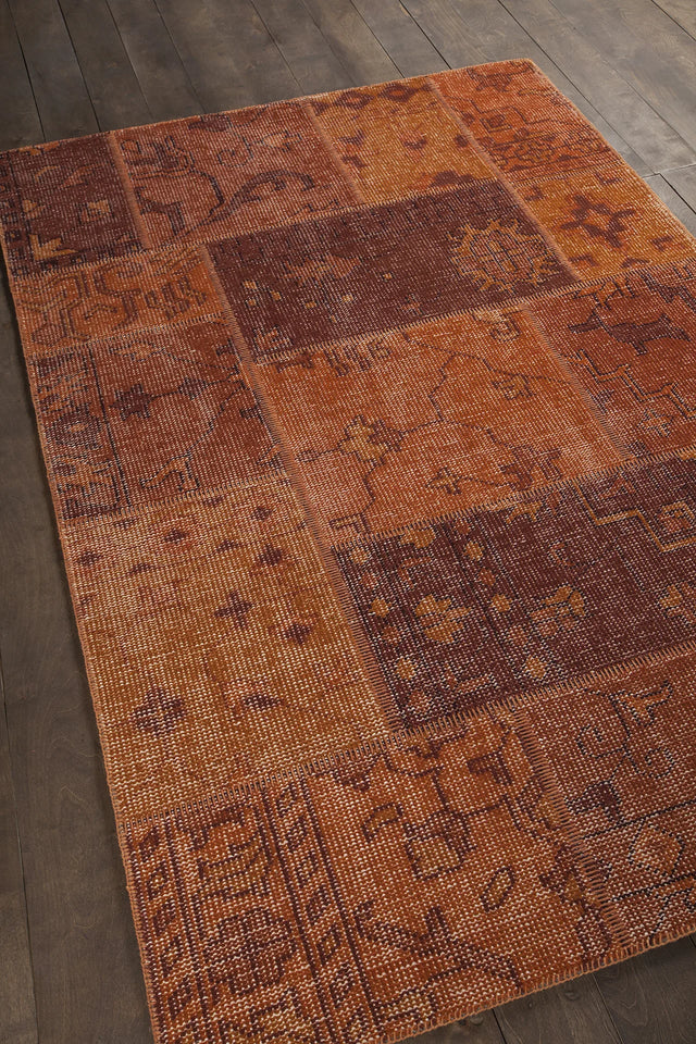 Chandra Fusion FUS-26305 Orange and rust and burgundy rug, angled side view