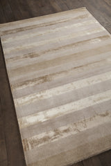 Chandra Gardenia GAR-30702 Beige and Taupe rug, angled side view