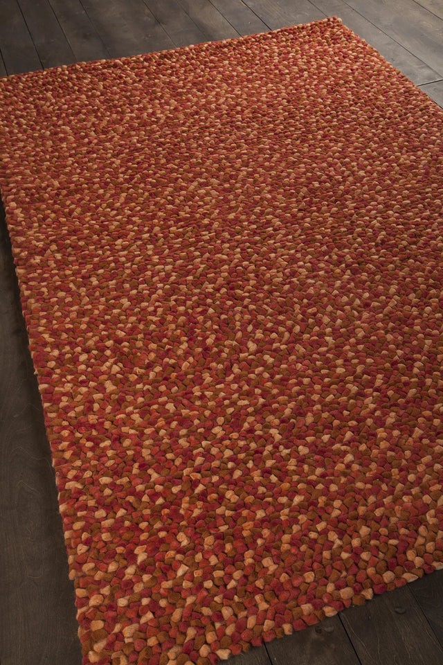 Chandra Gems GEM-9600 Red and Maroon and Orange rug, angled side view