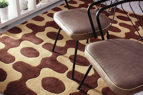 Chandra Inhabit INH-21600 Brown and Tan rug, shown in a styled room setting