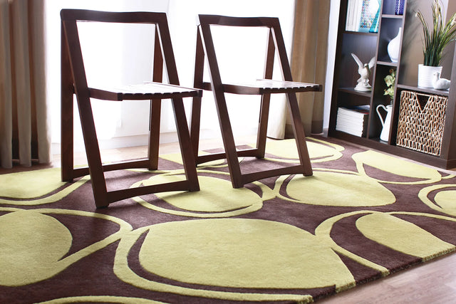 Chandra Inhabit INH-21604 Brown and Green rug, shown in a styled room setting