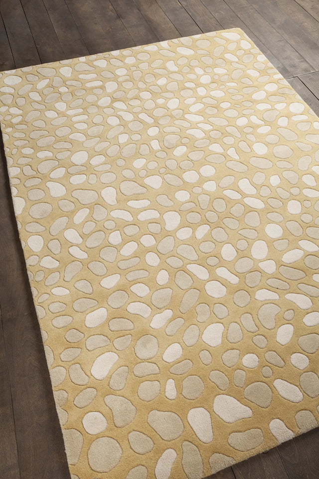 Chandra Inhabit INH-21620 Gold and Taupe rug, angled side view