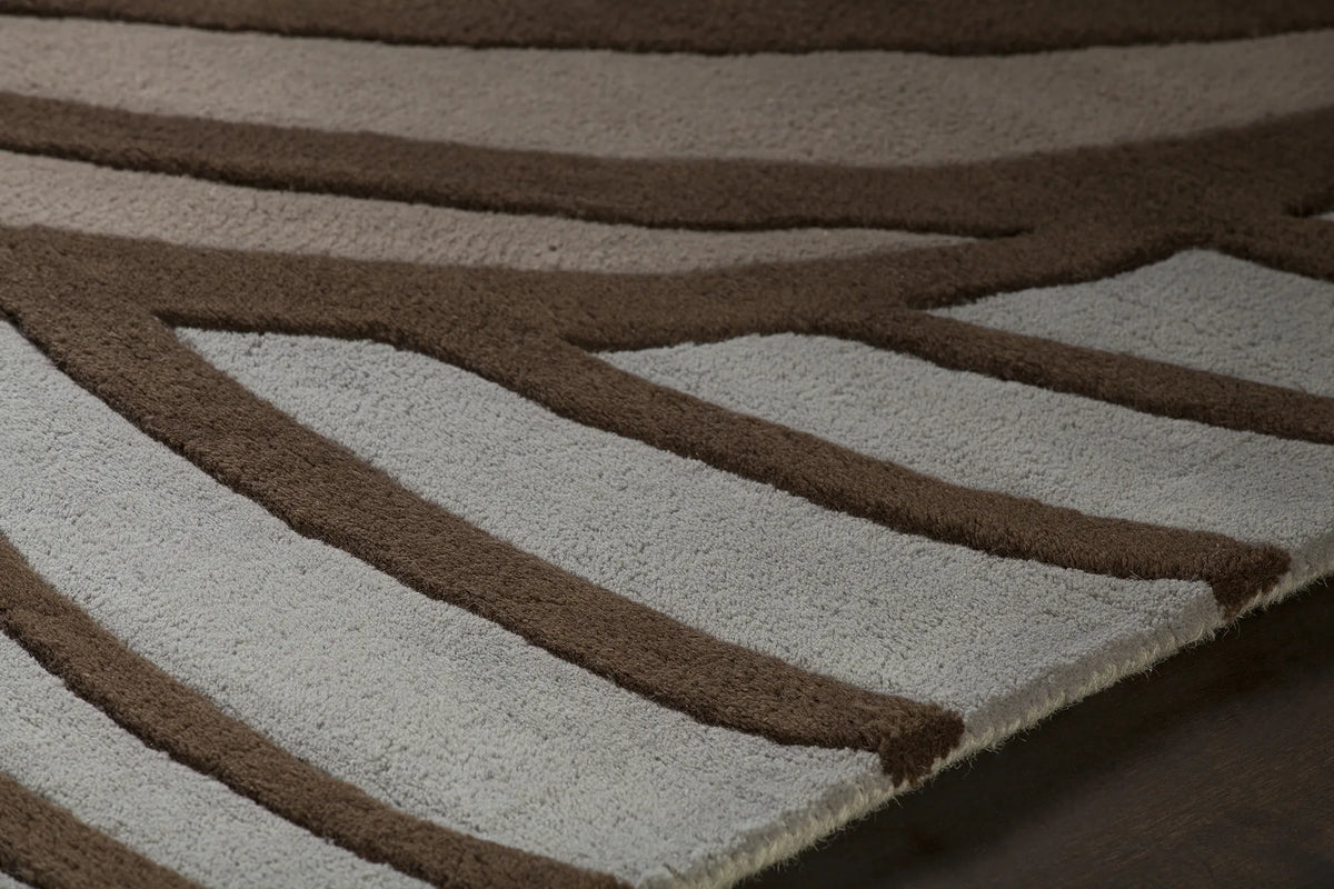 Chandra Inhabit INH-21622 Brown and Blue rug, side detail view