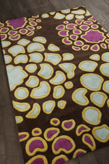 Chandra Inhabit INH-21626 Brown and Pink and Blue and Yellow rug, angled side view