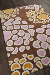 Chandra Inhabit INH-21627 Brown and Orange and Pink and White rug, angled side view