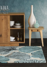 Chandra Jessica Swift JES-28905 White and Black and Teal rug, shown in a room setting