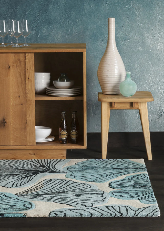 Chandra Jessica Swift JES-28905 White and Black and Teal rug, shown in a room setting