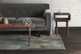 Chandra Jessica Swift JES-28907 Grey and White and Blue and Black and Gold rug, shown in a room setting