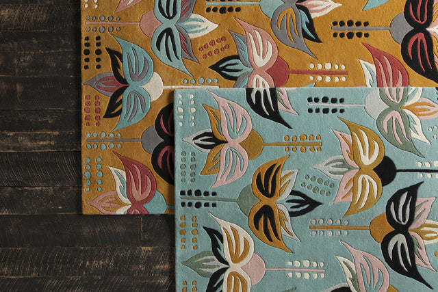 Chandra Jessica Swift JES-28911 Teal and Pink and Cream and Black and Grey and Yellow rug, styled detail view
