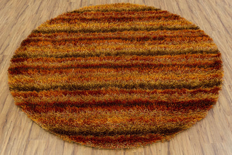Chandra Kubu KUB-16500 Red and Orange and Brown round rug, flat view