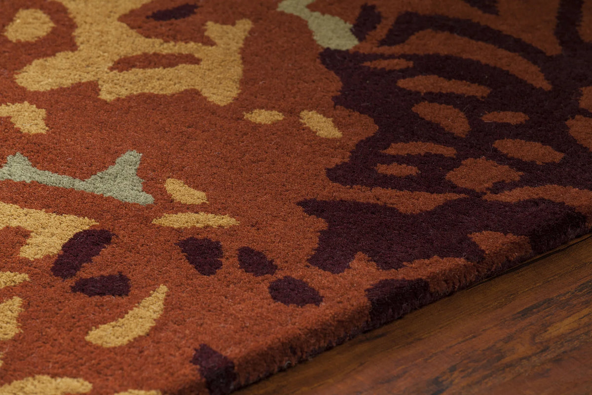 Chandra Nirvana NIR-6604 Green and Red and Burgundy and Brown rug, side detail view