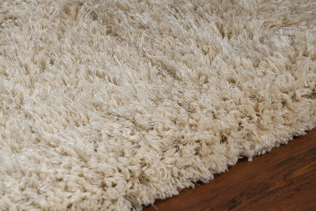 Chandra Osim OSI-35101 Beige rug, side detail view