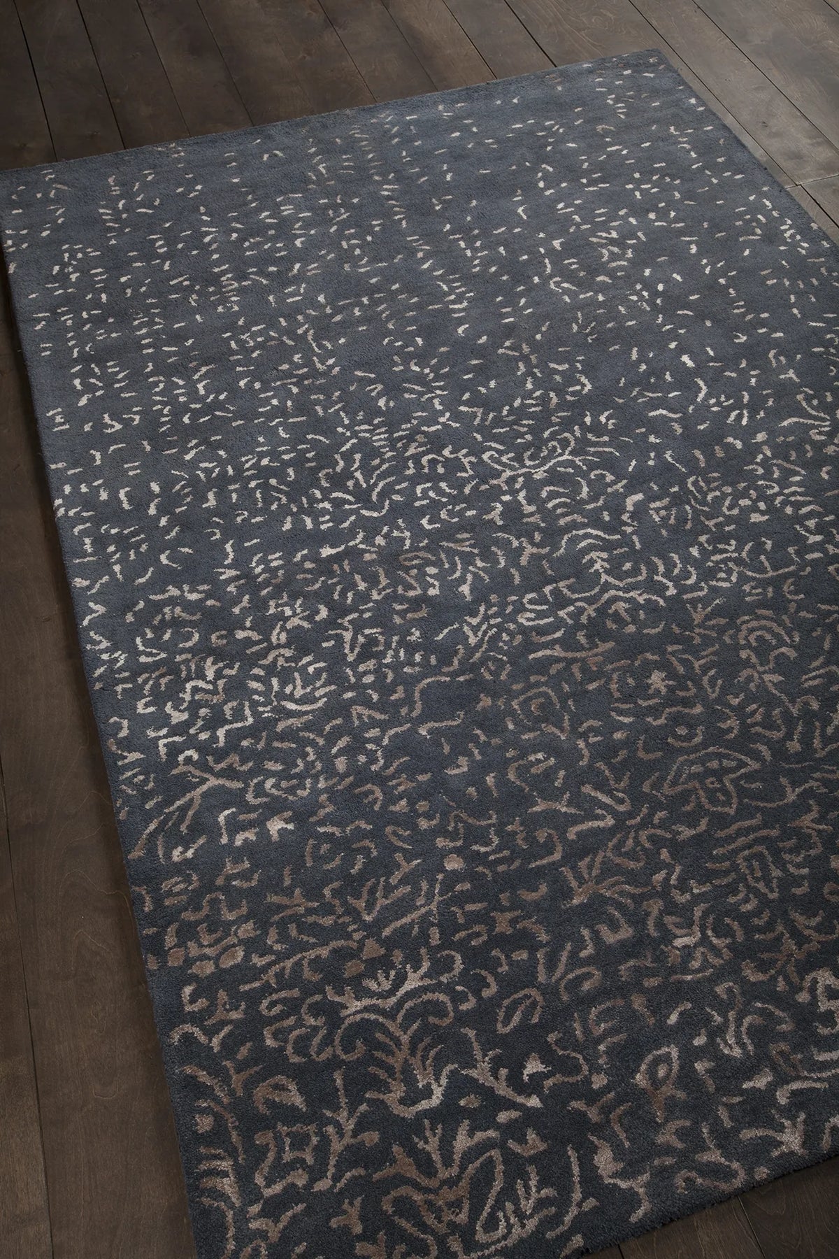 Chandra Rupec RUP-39614 Navy and Beige rug, angled side view