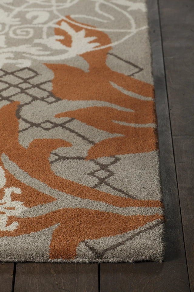 Chandra Stella STE-52207 Tan and Cream and Brown and Orange and Blue rug, corner detail