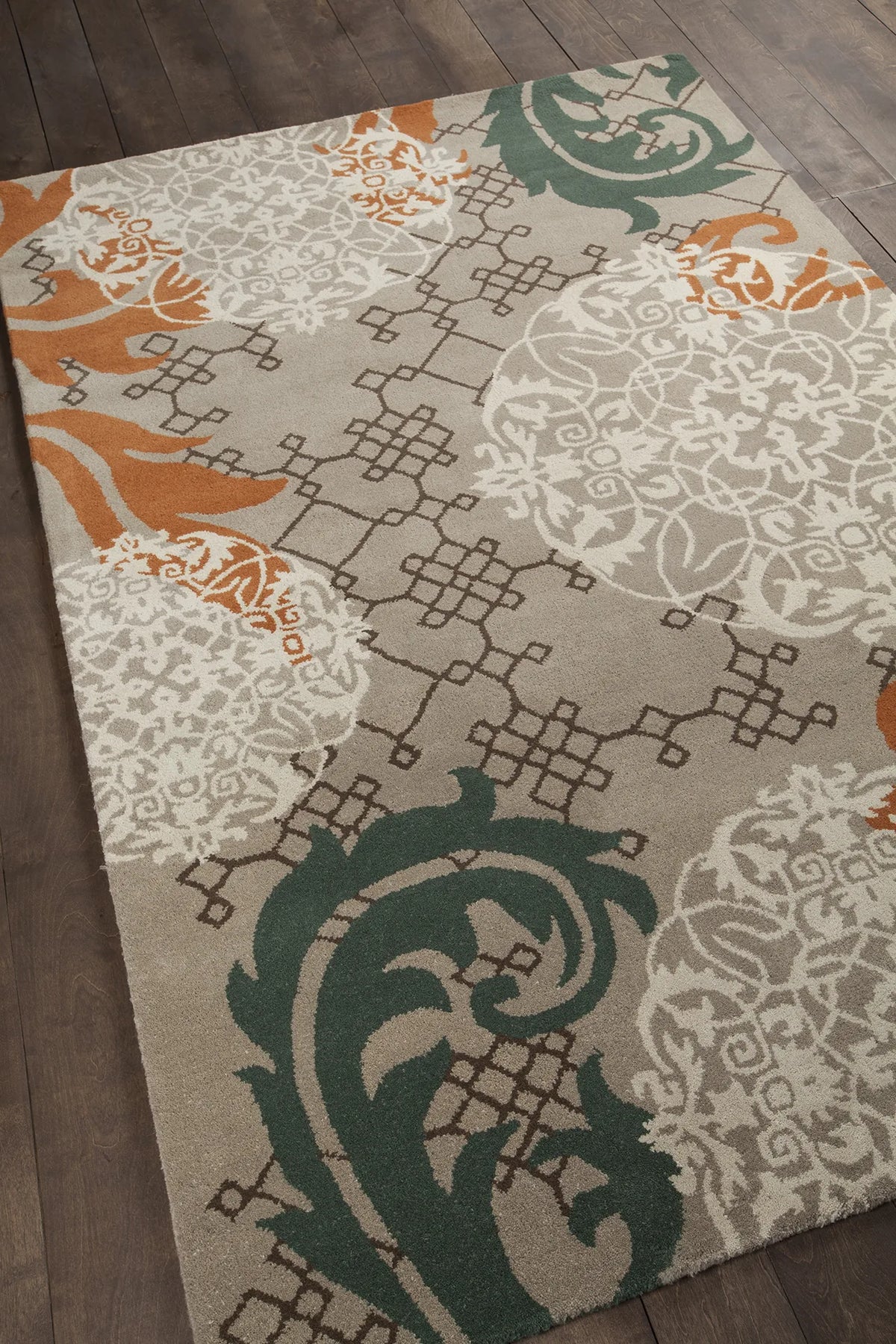 Chandra Stella STE-52207 Tan and Cream and Brown and Orange and Blue rug, angled side view