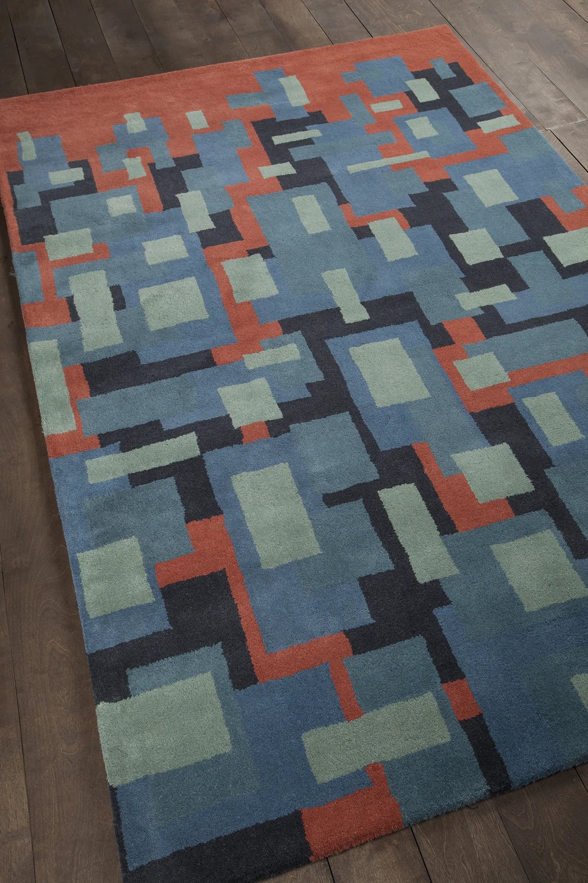 Chandra Stella STE-52249 Blue and Red and Charcoal rug, angled side view