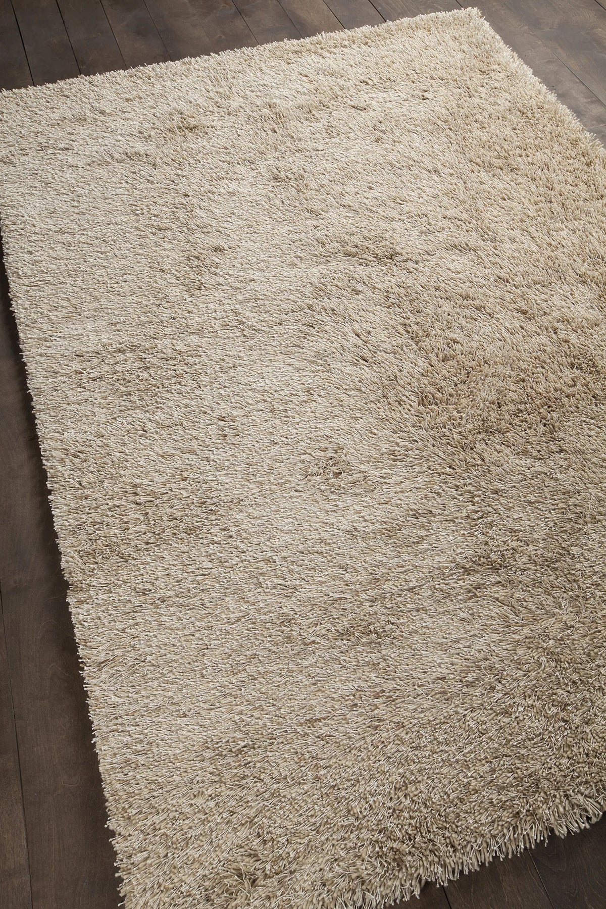 Chandra Sterling STE-21800 Cream rug, angled side view