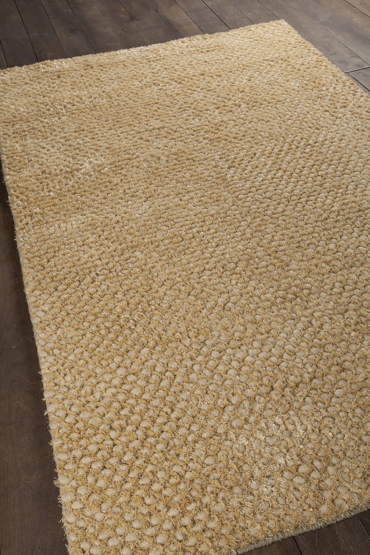 Chandra Strata STR-1160 Gold and Tan rug, angled side view