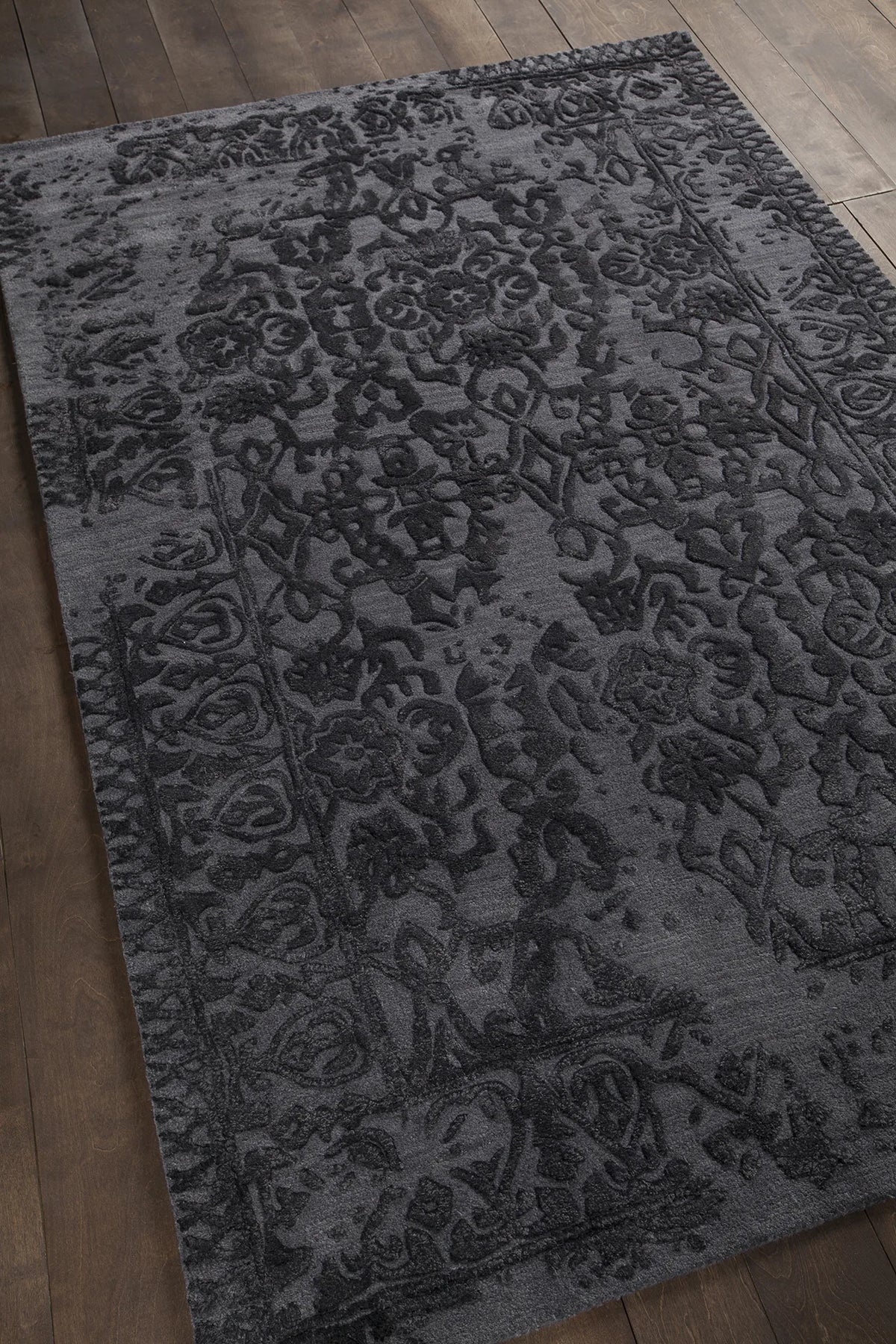 Chandra Xia XIA-43700 Black rug, angled side view