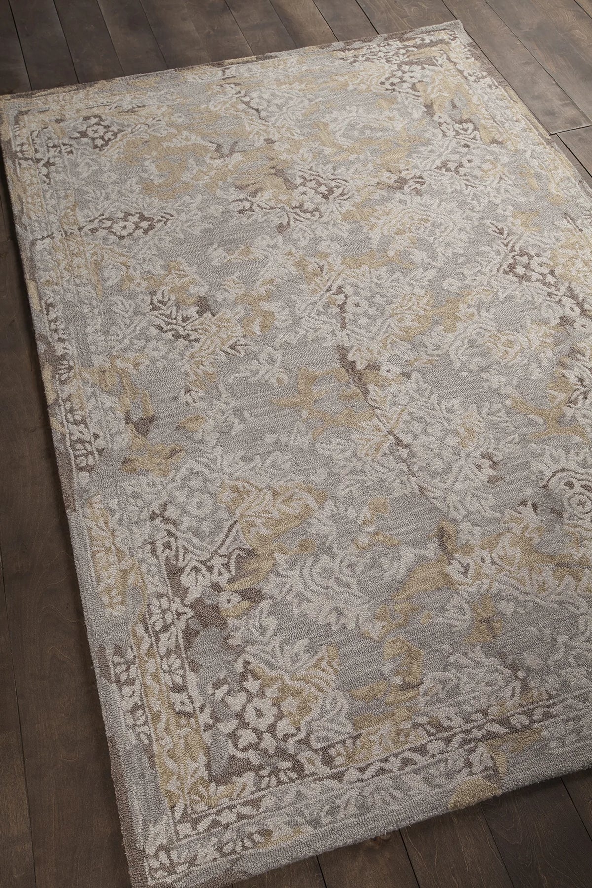 Chandra Zyana ZYA-43900 grey and brown and gold and beige rug, angled side view