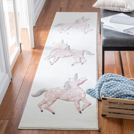 Safavieh Carousel Kids 100 2'-0" x 8'-0" Rug in Ivory / Pink