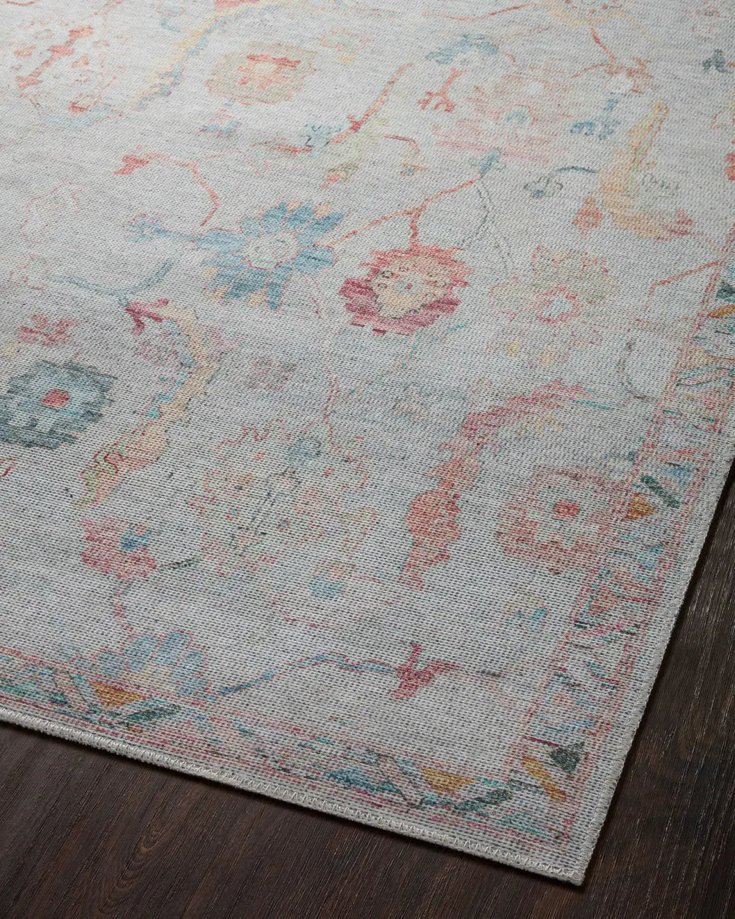 Loloi Elysium Ely-01 Pebble/Multi Rug - angled corner on wood