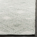 Safavieh Montauk 5'-0" x 8'-0" Rug in Light Green / Ivory