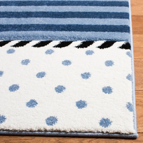 Safavieh Carousel Kids 100 4'-0" x 6'-0" Rug in Navy / Ivory