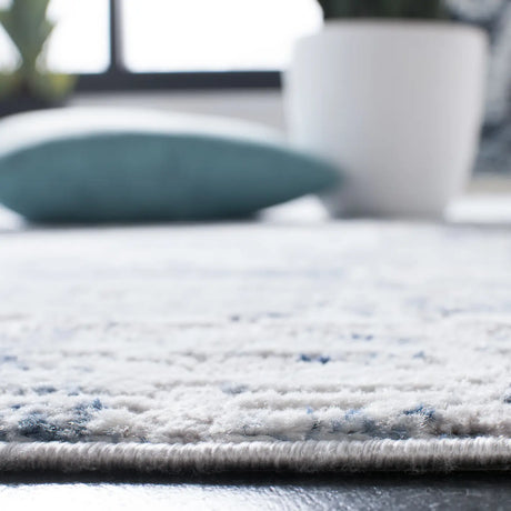 Safavieh Amelia 700 5'-3" x 7'-6" Rug in Blue / Grey