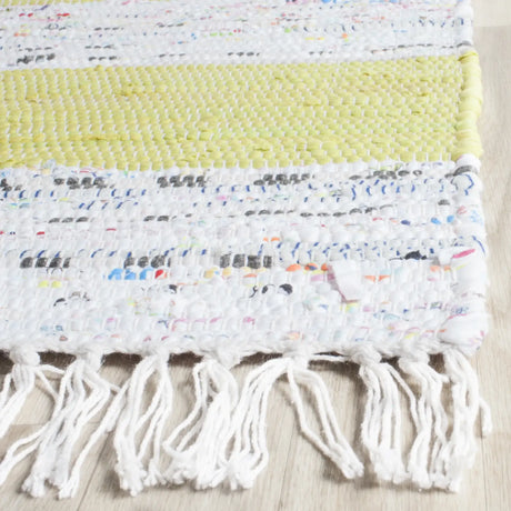 Safavieh Montauk 5'-0" x 7'-0" Rug in Ivory / Light Green