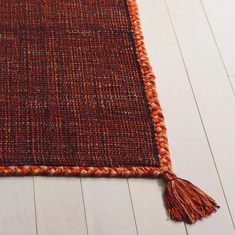 Safavieh Montauk 4'-0" x 6'-0" Rug in Orange / Black