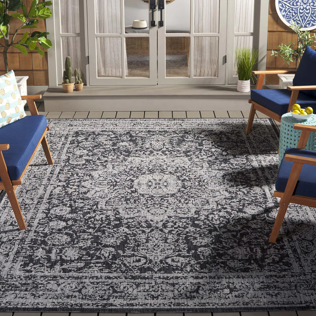Safavieh Courtyard 6'-7" x 9'-6" Rug in Grey / Black