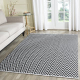 Safavieh Montauk 5'-0" x 7'-0" Rug in Black / Ivory