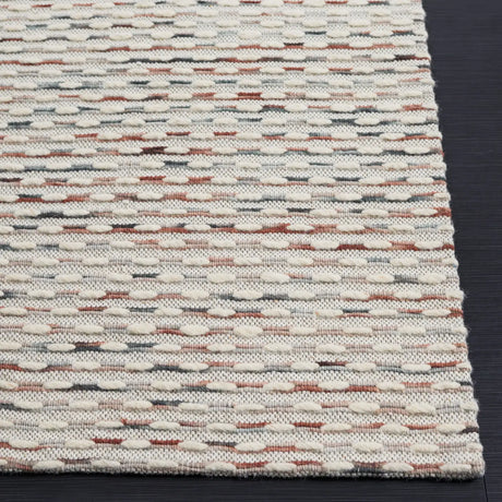 Safavieh Marbella 4'-0" x 6'-0" Rug in Beige / Rust