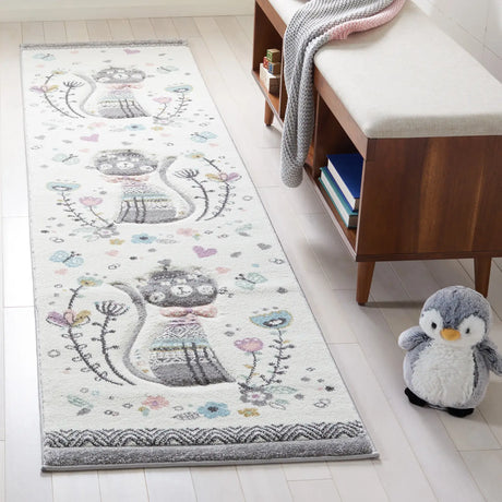 Safavieh Carousel Kids 100 2'-3" x 6'-0" Rug in Ivory / Pink