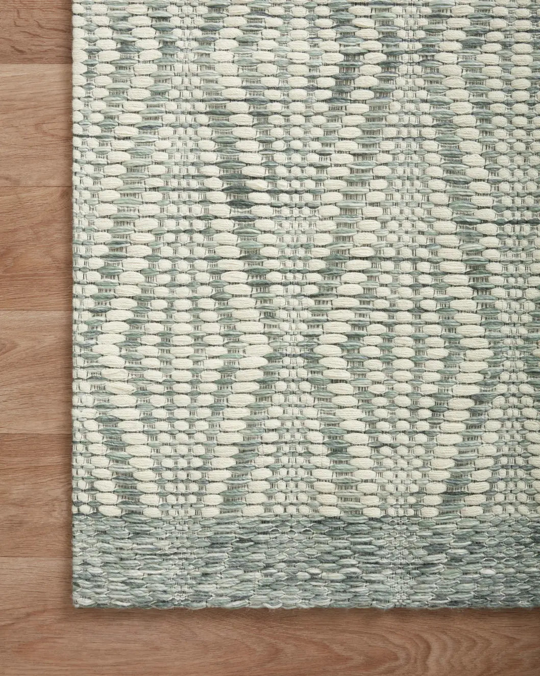 Loloi Kenzie Knz-01 Ivory/Sage Rugs - corner on wood
