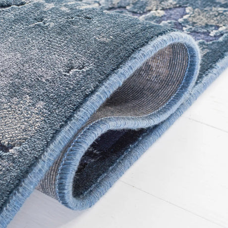 Safavieh Paradise 4'-0" x 5'-7" Rug in Blue / Black