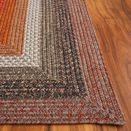 Safavieh Braided 5'-0" x 8'-0" Rug in Brown / Rust