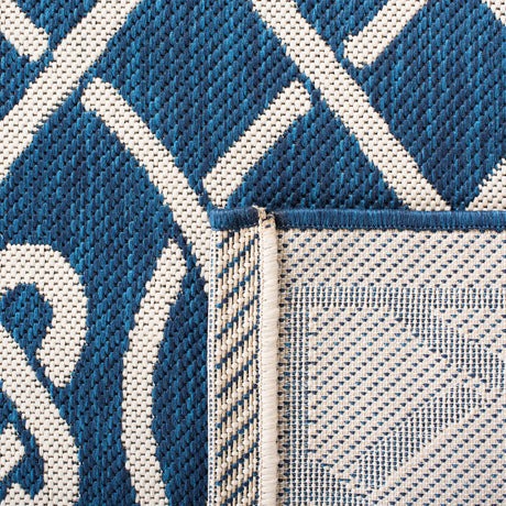 Safavieh Courtyard 5'-3" x 7'-7" Rug in Navy / Light Beige