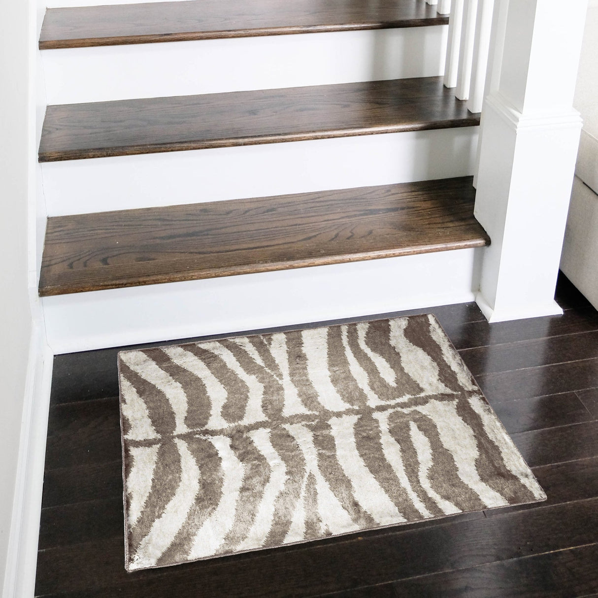 Dalyn Akina AK1 Mocha Rug shown in a room